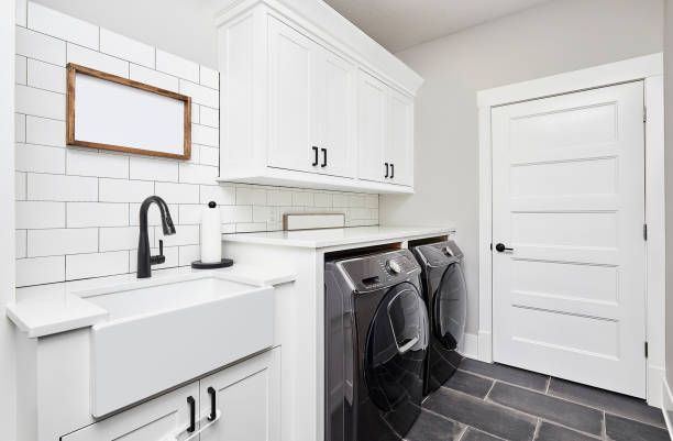 Laundry room with brand new washing machine and dryer